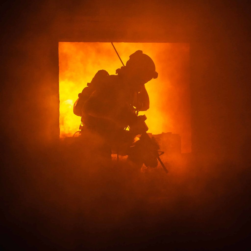 Assault team member comes through the window on fire